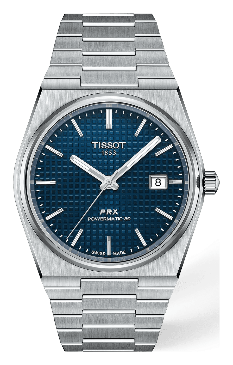 Tissot PRX 40 Powermatic 80 with a blue waffle-pattern dial, a round bezel and a date at 3, on a steel bracelet with stepped links